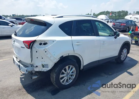 2016 Mazda Cx-5 Touring z USA, uszkodzony, nr VIN JM3KE2CY5G0677246
